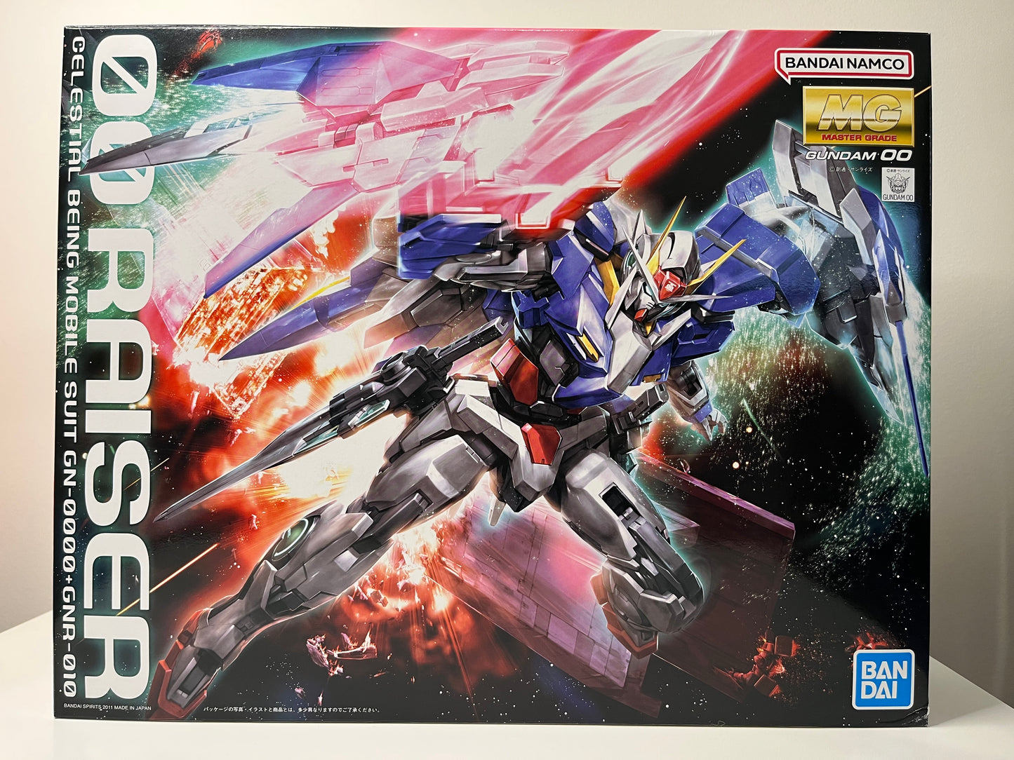 Gundam 00 Raiser GN-0000+GNR-010 00 - MG Master Grade 1:100 - 4573102630827