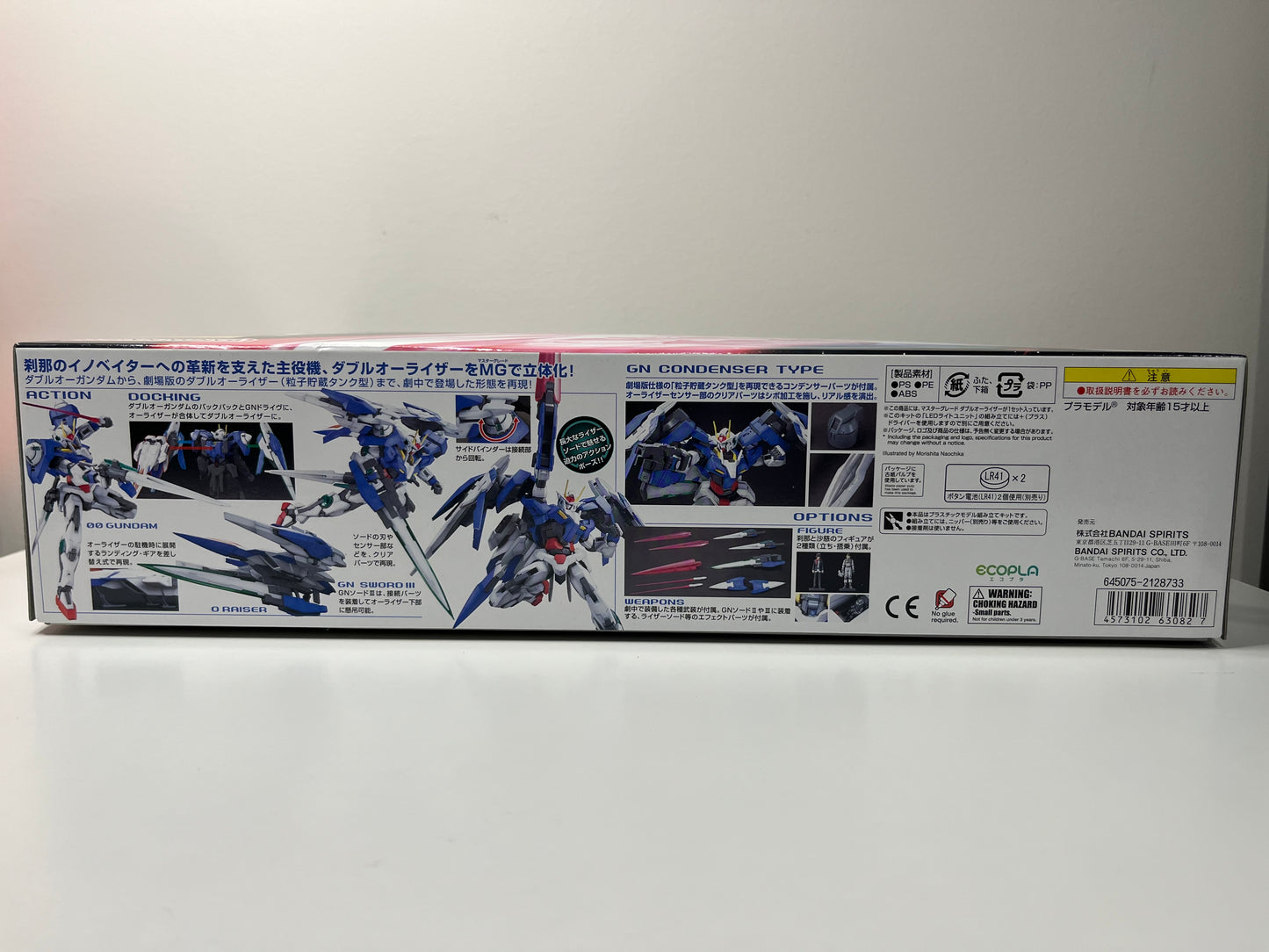 Gundam 00 Raiser GN-0000+GNR-010 00 - MG Master Grade 1:100 - 4573102630827